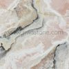 Natural Pink Onyx slab featuring soft blush pink, ivory crystalline formations and subtle grey mineral veins from Iran.
