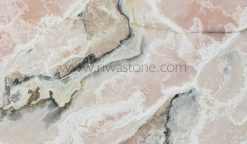 Natural Pink Onyx slab featuring soft blush pink, ivory crystalline formations and subtle grey mineral veins from Iran.