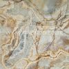 Sunset Onyx natural slab featuring translucent grey-green crystals with warm golden mineral veins from Iran.